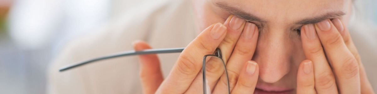 Woman feeling overwhelmed with work related stress