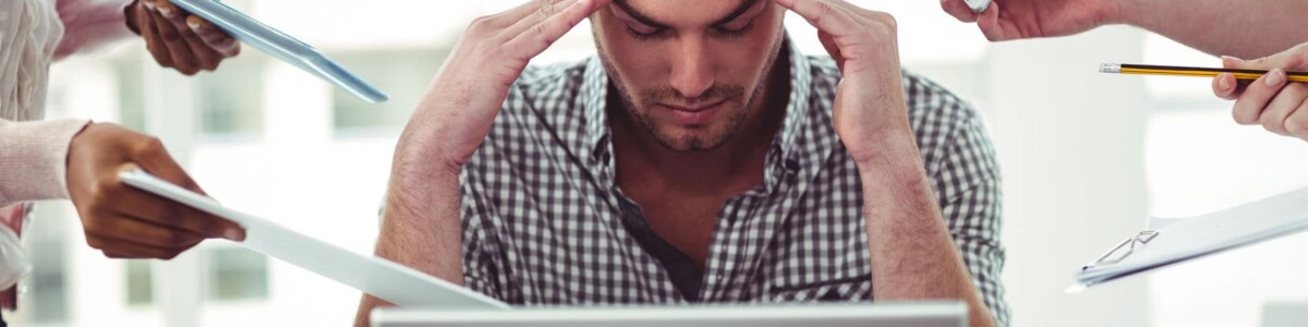 man suffering with work related stress