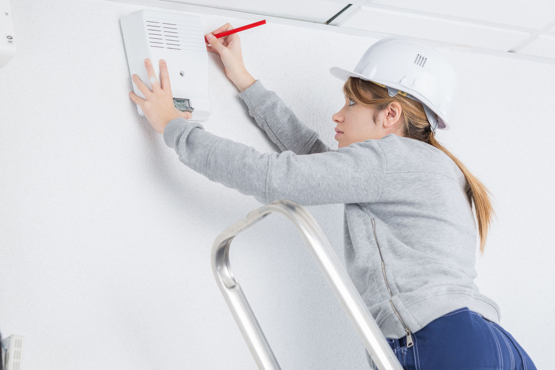 Ladder safety checklist Woman using ladders
