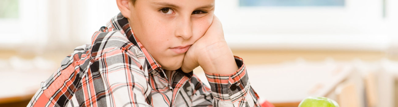 Child with adhd distracted in class