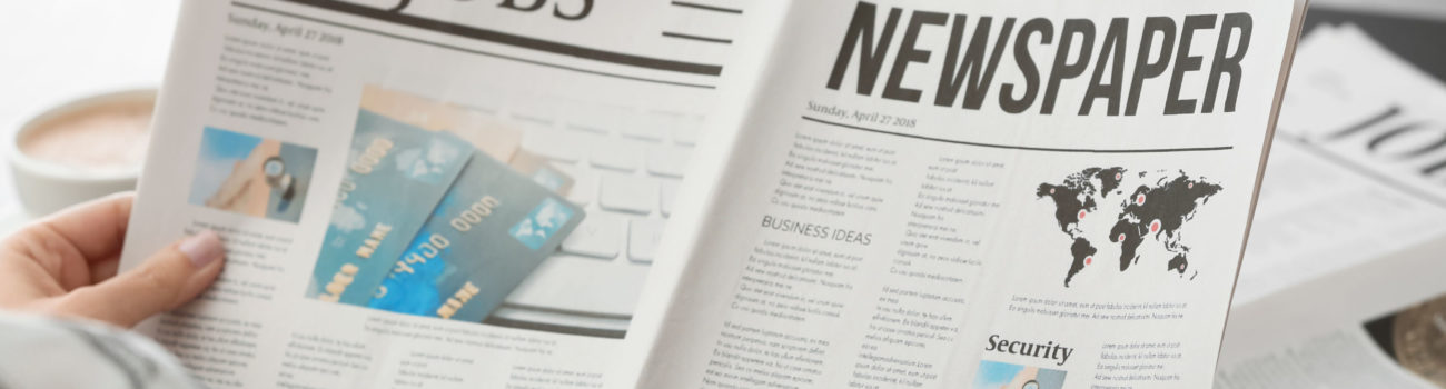 Advertisement of job Person looking for recruitment job advertisements in newspaper