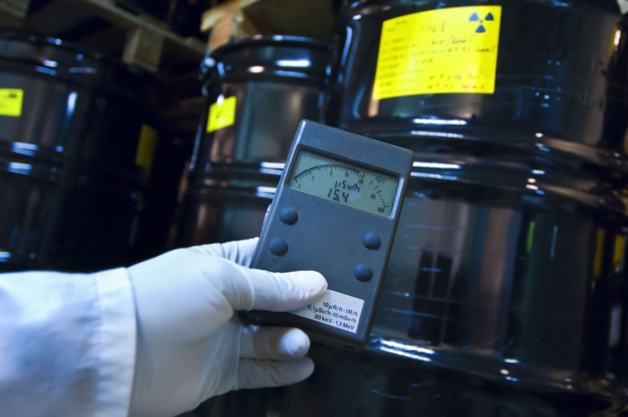 Man checking radiation of hazardous substances Man checking radiation of hazardous substances