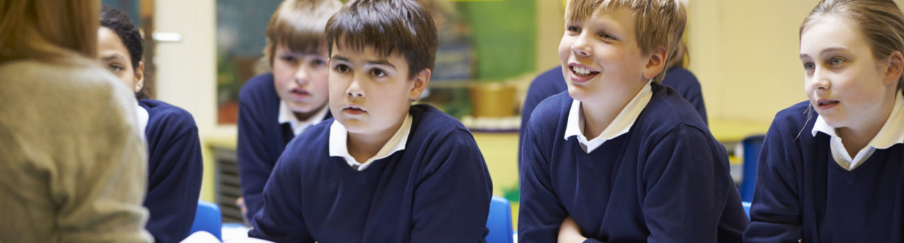 Teacher explaining about radicalisation to pupils