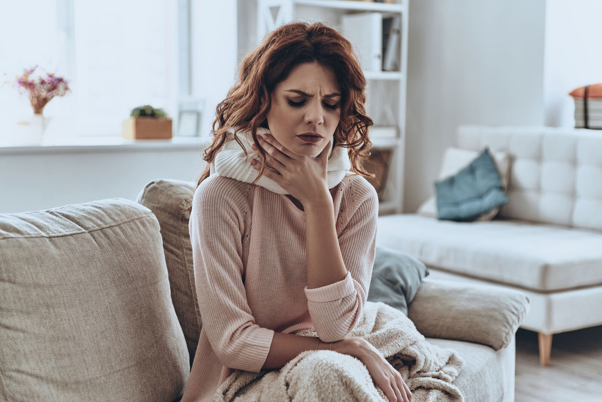 Woman suffering from food poisoning after eating contaminated food Woman suffering from food poisoning after eating contaminated food