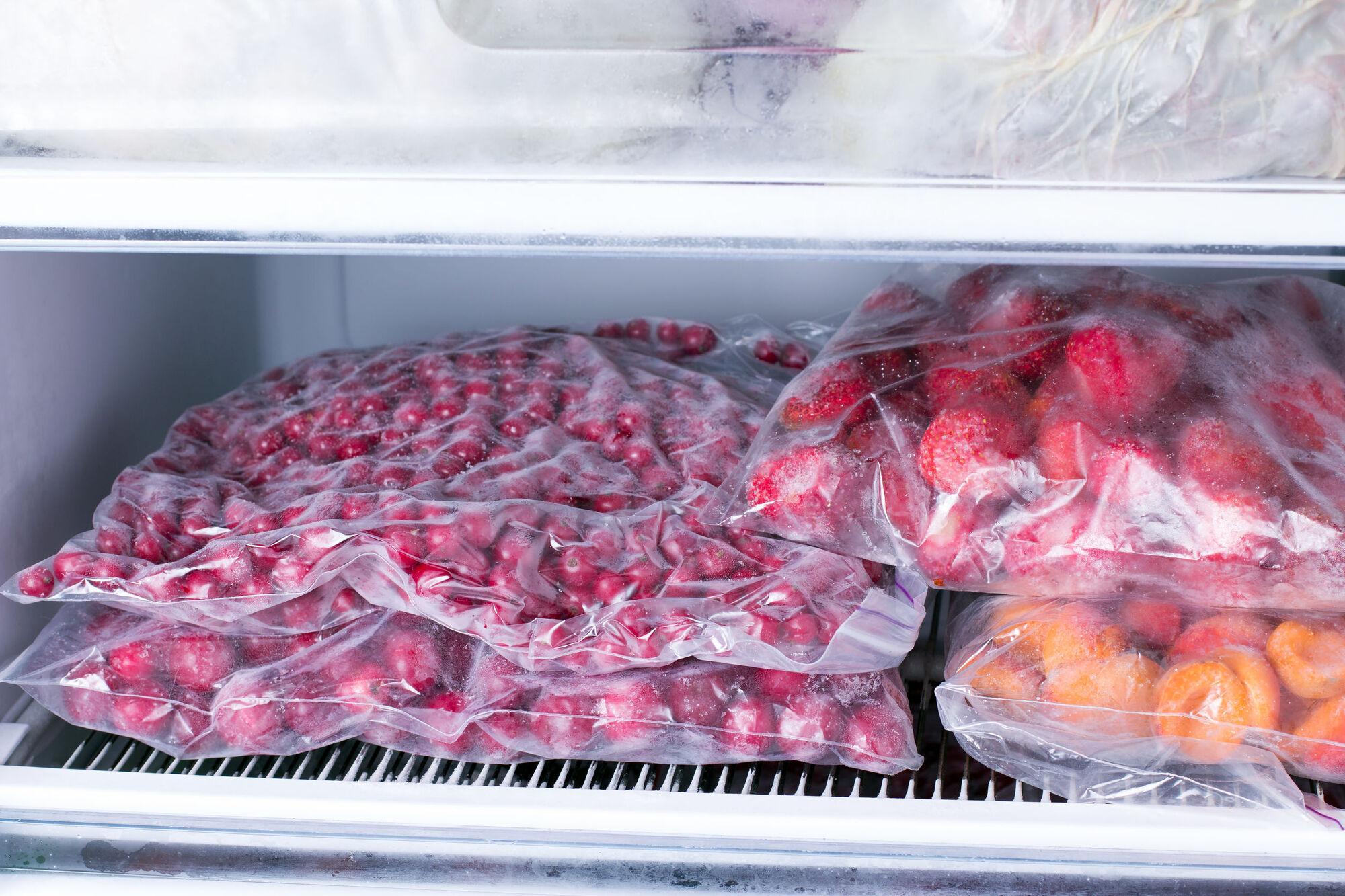 Frozen food covered in plastic food bags to prevent chemical contamination Frozen food covered in plastic food bags to prevent chemical contamination