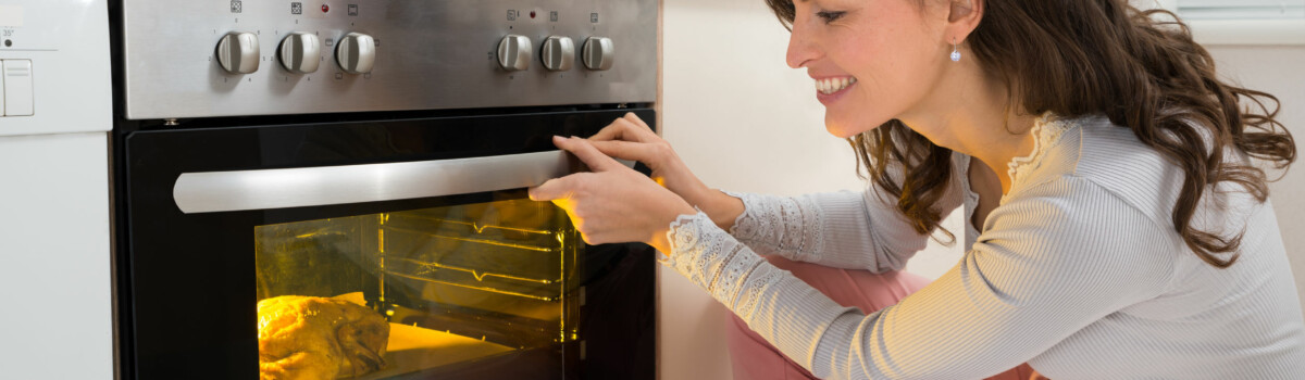 Lady cooking food before her EHO home inspection