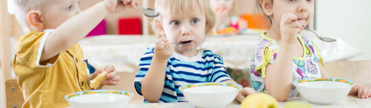 Children enjoying there school breakfast club food