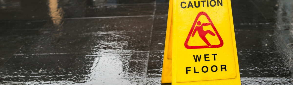 Workplace who have put wet floor sign outside the building to prevent workers from slipping and injuring themselves