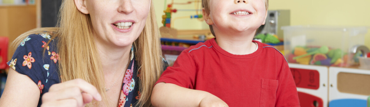 Designated safeguard lead sat in classroom with child