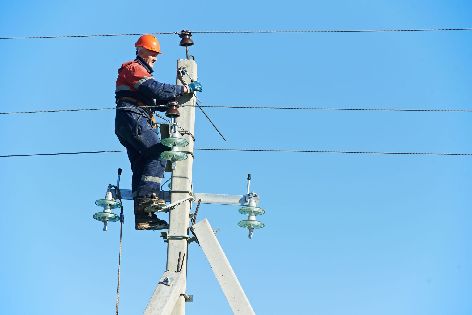 Electrician Lineman Working With Electricity. Electrician Lineman Working With Electricity.