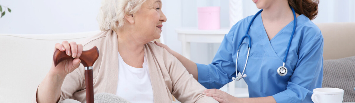 Nurse sat with elderly person before capacity assessment