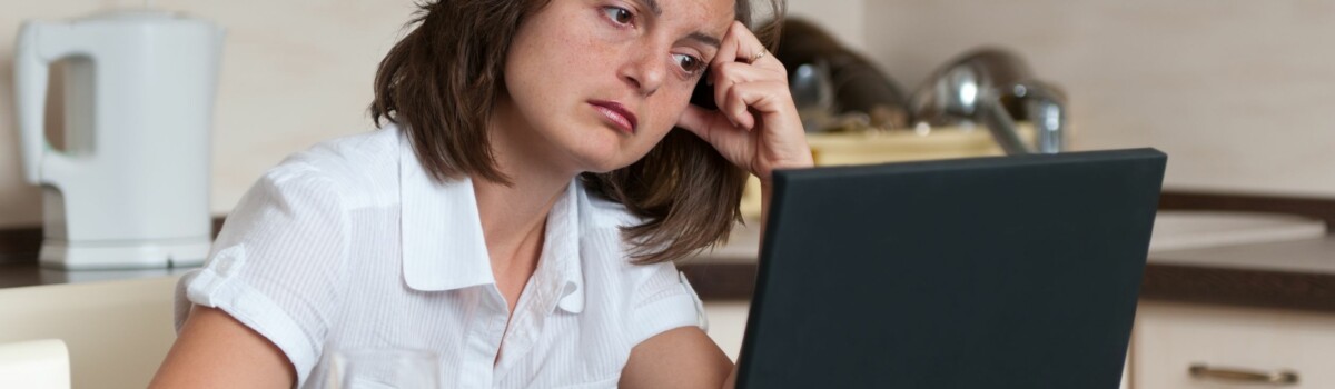 Woman struggling with burnout while working at home