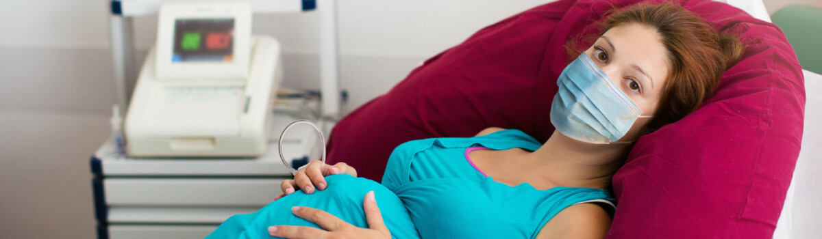 Pregnant woman in labour on hospital ward