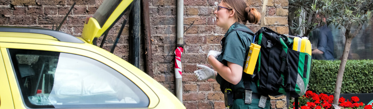 Female paramedic getting ready to go into prison