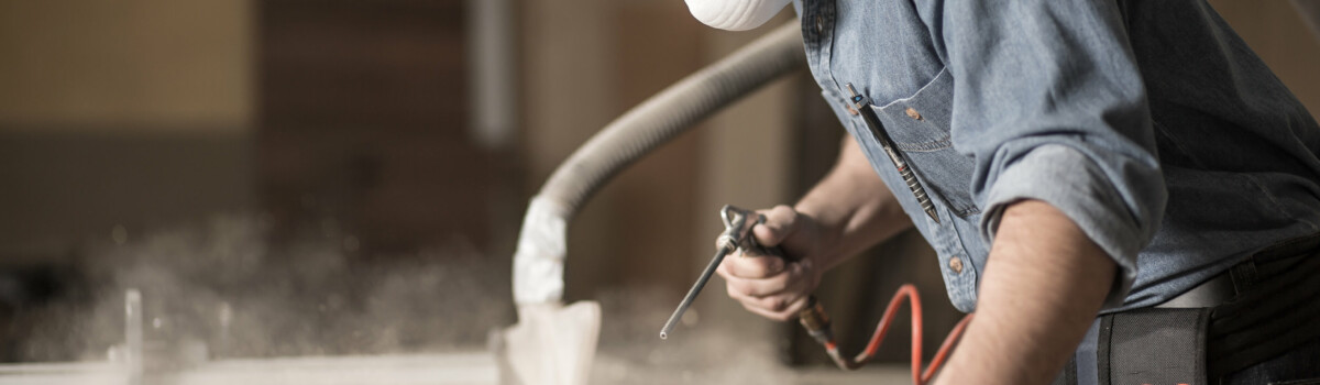 Carpenter being protected by a mask through COSHH regulations