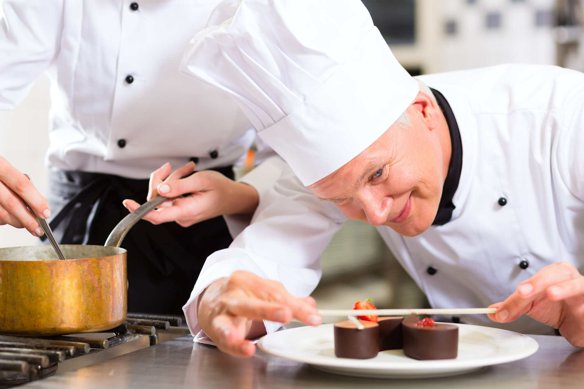 The sous chef is high up in the chef hierarchy and has many responsibilities The sous chef is high up in the chef hierarchy and has many responsibilities