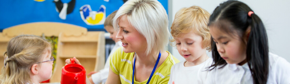 Teaching assistant volunteering in after school club