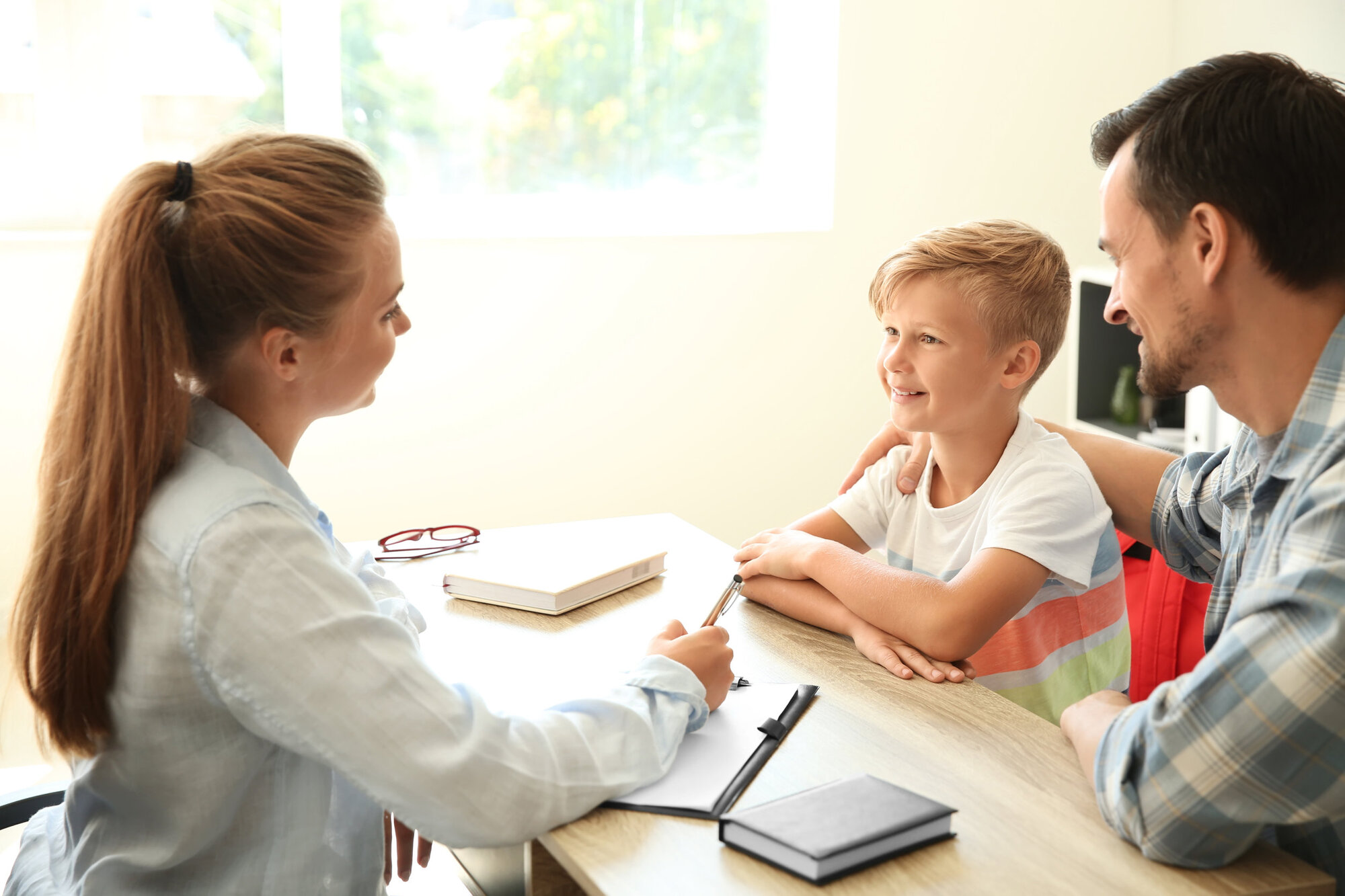 Safeguarding in schools involves parents meeting teachers Safeguarding in schools involves parents meeting teachers