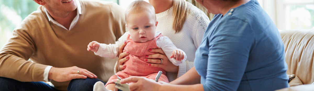 Social worker assisting new parents