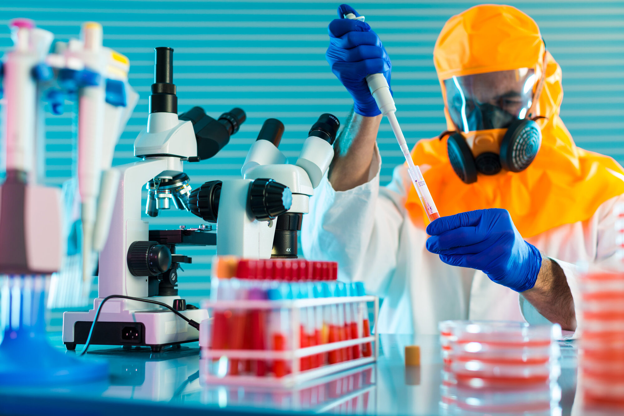 Employee reducing the risk of harm with safety equipment Employee reducing the risk of harm with safety equipment