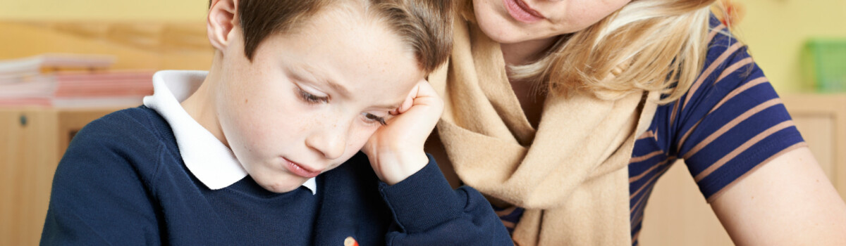 Boy in school struggling to learn times tables