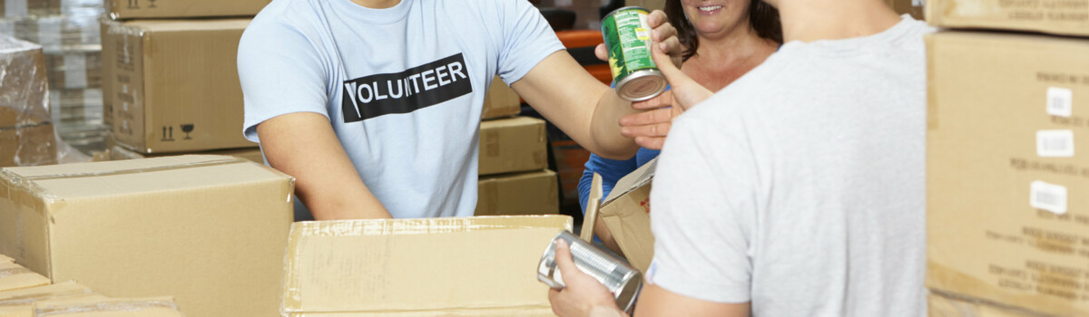 Volunteers helping with food bank donations