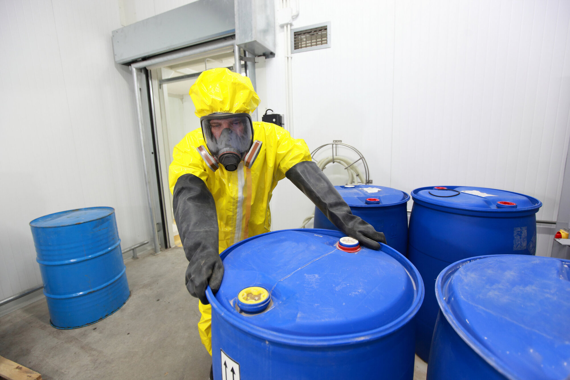 Man using an oil spill kit Man using an oil spill kit