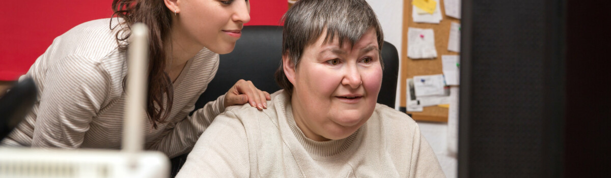 Woman and carer with learning disability