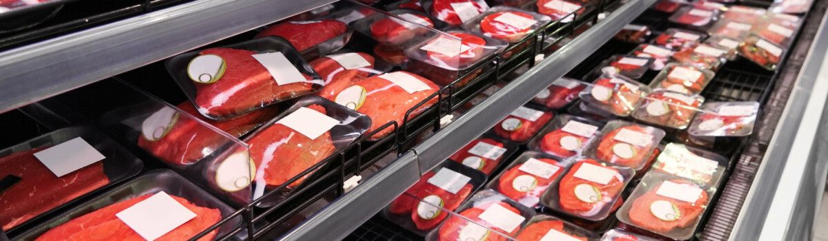 Meat with a sell by date on display in a supermarket