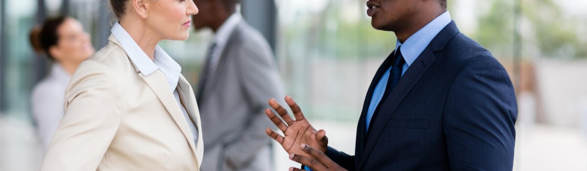 Two business people talking