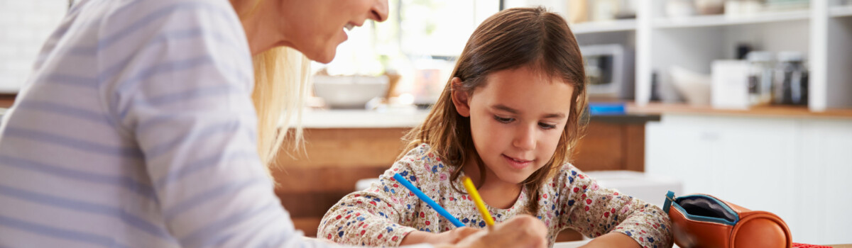 Young girl having home schooling