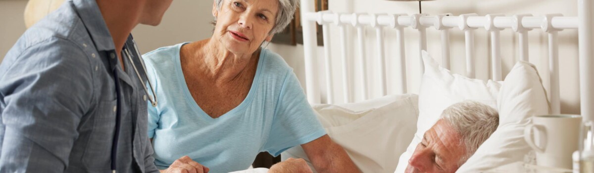 Doctor visiting family in palliative care