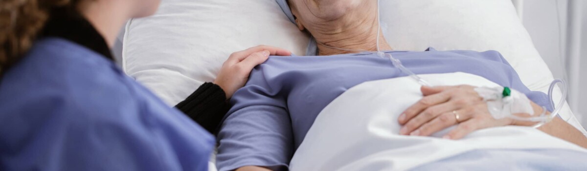 Woman being cared for in hospital