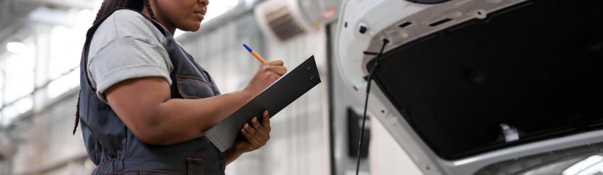 Mechanic working at car repair company