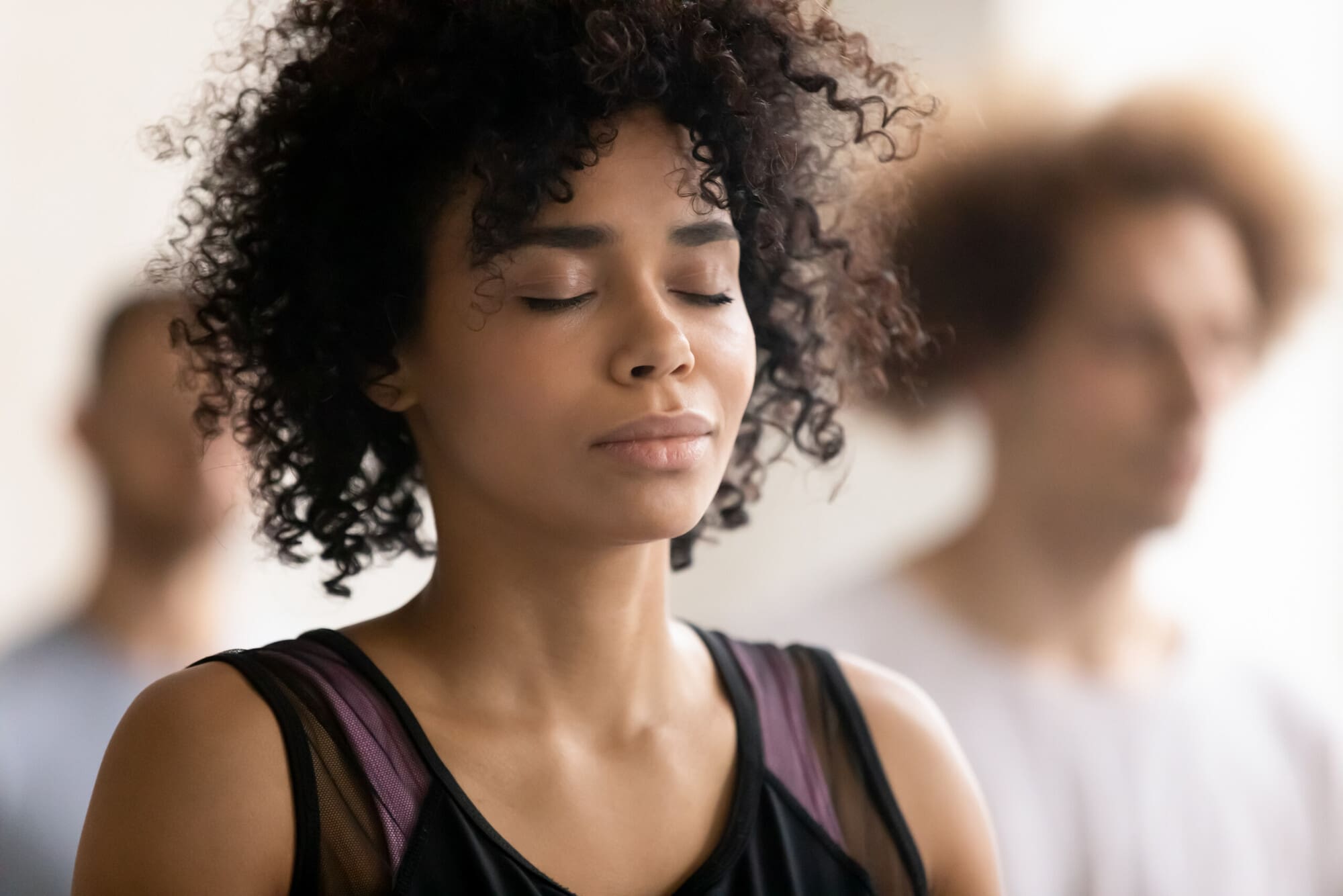 women-practicing-yoga- Managing Anger through yoga