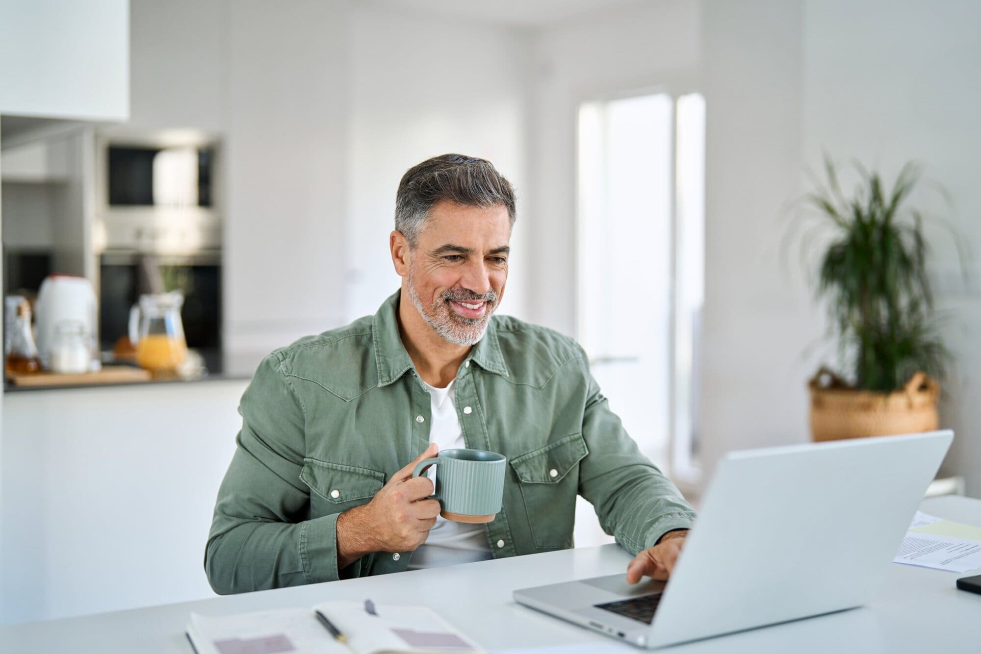 Hybrid working models 3 Male working from home scaled